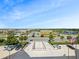 Elevated view of a building with a courtyard and well-maintained landscaping at 901 S Atlantic Ave # 5, Ormond Beach, FL 32176