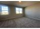 Bright bedroom featuring plush carpeting and two windows offering plenty of natural light at 9338 Bolshoi Aly, Winter Garden, FL 34787