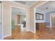Inviting living area showcasing hardwood floors and an open layout with seamless flow to other rooms at 980 Oleander Se Dr, Winter Haven, FL 33880