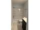 Bathroom features tub with shower and modern vanity at 1117 Cambourne Dr, Kissimmee, FL 34758