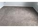 Bedroom features carpet flooring, base trim and light gray walls at 1117 Cambourne Dr, Kissimmee, FL 34758