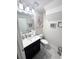 Charming bathroom featuring a modern vanity, neutral walls and decor at 11588 Whistling Pine Way, Orlando, FL 32832