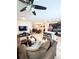 Open-concept living room that showcases the kitchen, dining area, and comfortable seating arrangement at 11588 Whistling Pine Way, Orlando, FL 32832