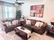 Cozy living room featuring comfortable seating, and stylish decor at 11588 Whistling Pine Way, Orlando, FL 32832