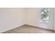 Bright bedroom with natural light, wood-look flooring and neutral walls creates a cozy and inviting atmosphere at 1209 S Station Pl # 306, Orlando, FL 32809