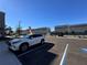 Apartment complex parking area shows ample space for resident and guest parking at 1209 S Station Pl # 306, Orlando, FL 32809