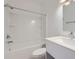 Bathroom with a tub-shower combo, a white vanity and a light-filled room at 1217 S Station Pl # 502, Orlando, FL 32809