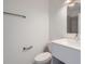 Modern bathroom featuring a white vanity, a mirror, and a chrome towel rack at 1217 S Station Pl # 502, Orlando, FL 32809