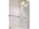 Bright bathroom with modern fixtures, vanity sink, and towel bar at 1217 S Station Pl # 502, Orlando, FL 32809