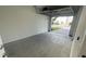 Two-car garage showing painted walls and access to community parking at 1217 S Station Pl # 502, Orlando, FL 32827