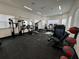 Well-equipped fitness center with treadmills, weights, and exercise machines at 1217 S Station Pl # 502, Orlando, FL 32809