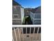 Balcony view between buildings overlooks manicured hedges, fountain, and green common areas at 136 Mcleods Way, Winter Springs, FL 32708