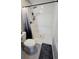 Modern walk-in shower features sleek fixtures, a detachable shower head, and neutral color palette at 136 Mcleods Way, Winter Springs, FL 32708