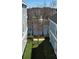 View between two homes towards a lake with a fountain at 136 Mcleods Way, Winter Springs, FL 32708