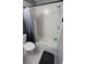 Bright bathroom shower featuring white tiles, a shower head, and a convenient shower curtain at 136 Mcleods Way, Winter Springs, FL 32708