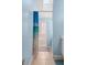 Bathroom features a glass block window providing natural light to the tiled shower at 140 Coco Plum, Davenport, FL 33897