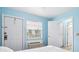 Bedroom featuring white doors and an air conditioning unit at 140 Coco Plum, Davenport, FL 33897
