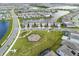 A neighborhood with a playground, a pond, a swimming pool, and modern single-Gathering homes at 14218 Lanikai Beach Dr, Orlando, FL 32827