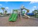 Playground with multiple slides and play equipment on a mulch surface at 14218 Lanikai Beach Dr, Orlando, FL 32827