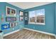 Bright bedroom with natural light and stylish decor at 15245 Blue Peacock Ln, Winter Garden, FL 34787