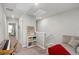Upstairs hallway featuring carpet flooring, and access to multiple rooms at 2052 Milkweed St, Ocoee, FL 34761