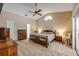 Main bedroom with abundant space, natural light and access to outdoor spaces at 2180 Lauren Ln, Deland, FL 32720