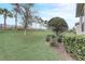 Lush backyard view with manicured landscaping and mature trees enhancing the property's appeal at 2282 Kaley Ridge Rd, Clermont, FL 34715
