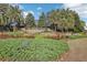 Professionally landscaped community sign for Highland Ranch, featuring vibrant plants and decorative elements at 2282 Kaley Ridge Rd, Clermont, FL 34715