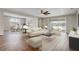 Comfortable living room with open floor plan, stylish furniture, and dining area at 2282 Kaley Ridge Rd, Clermont, FL 34715