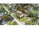 Aerial view of a home and its surrounding properties, showcasing the neighborhood and nearby streets at 26 Backspin Ln, Orlando, FL 32804