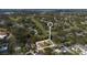 Property located near golf course, close to the water and surrounded by lush greenery at 26 Backspin Ln, Orlando, FL 32804