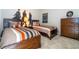 Bedroom featuring two twin beds, creating a playful and inviting space at 2613 Santosh Cv, Kissimmee, FL 34746