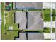 Aerial view showcasing roof lines, landscaping, and neighborhood layout at 2714 Forestdale St, St Cloud, FL 34771