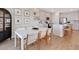 Stylish dining area with a modern table and chairs, next to the open kitchen at 2714 Forestdale St, St Cloud, FL 34771
