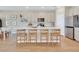 Spacious kitchen with a central island, stainless steel appliances, and ample counter space at 2714 Forestdale St, St Cloud, FL 34771