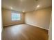 Neutral bedroom with recessed lighting and a large window at 2765 Redblush Ter, St Cloud, FL 34772
