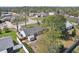 Aerial view of home featuring a fenced backyard, patio, shed, and mature trees at 2801 W Covington Dr, Deltona, FL 32738