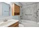 This bathroom features a tub, cabinet, and sink at 2801 W Covington Dr, Deltona, FL 32738