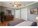 A comfortable bedroom features a closet and scenic artwork on the walls, creating a relaxing atmosphere at 2801 W Covington Dr, Deltona, FL 32738