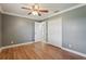 This bedroom features a closet and wood flooring at 2801 W Covington Dr, Deltona, FL 32738