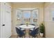 Cozy breakfast nook with a bay window, offering a serene spot for dining and a pantry for storage at 2801 W Covington Dr, Deltona, FL 32738