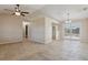 Bright and airy living room featuring tile floors and sliding glass doors to the backyard at 2801 W Covington Dr, Deltona, FL 32738