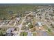 Aerial view of the neighborhood with neatly arranged homes surrounded by lush greenery at 2801 W Covington Dr, Deltona, FL 32738