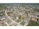 High angle aerial view of a developed residential neighborhood with mature trees and lawns at 2801 W Covington Dr, Deltona, FL 32738