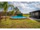 Backyard features an above ground pool with a small shed in the background at 36010 Kalamazoo Dr, Eustis, FL 32736