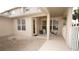 Covered back patio with brick flooring, offering an inviting outdoor space for dining and relaxation at 4527 Sunset Ln, Oviedo, FL 32765