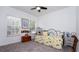 Comfortable bedroom with lots of natural light, an overhead ceiling fan, and neutral colored walls at 4527 Sunset Ln, Oviedo, FL 32765