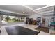 Well-organized garage with storage racks and rubber floor mats at 4527 Sunset Ln, Oviedo, FL 32765