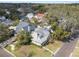 Beautiful aerial view showcasing the home's location, lush landscaping, and surrounding neighborhood at 501 Sheridan Blvd, Orlando, FL 32804