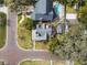 Bird's-eye view of the home with a brick-paved street, lush landscape, and garage access at 501 Sheridan Blvd, Orlando, FL 32804